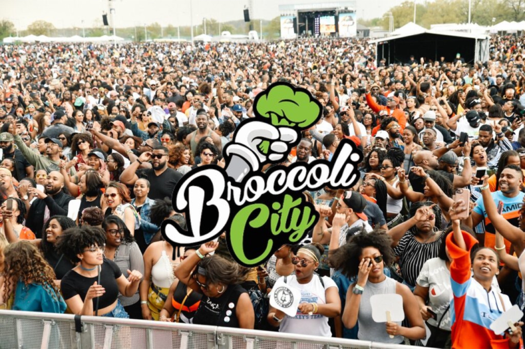 Large Broccoli City festival crowd with logo overlay