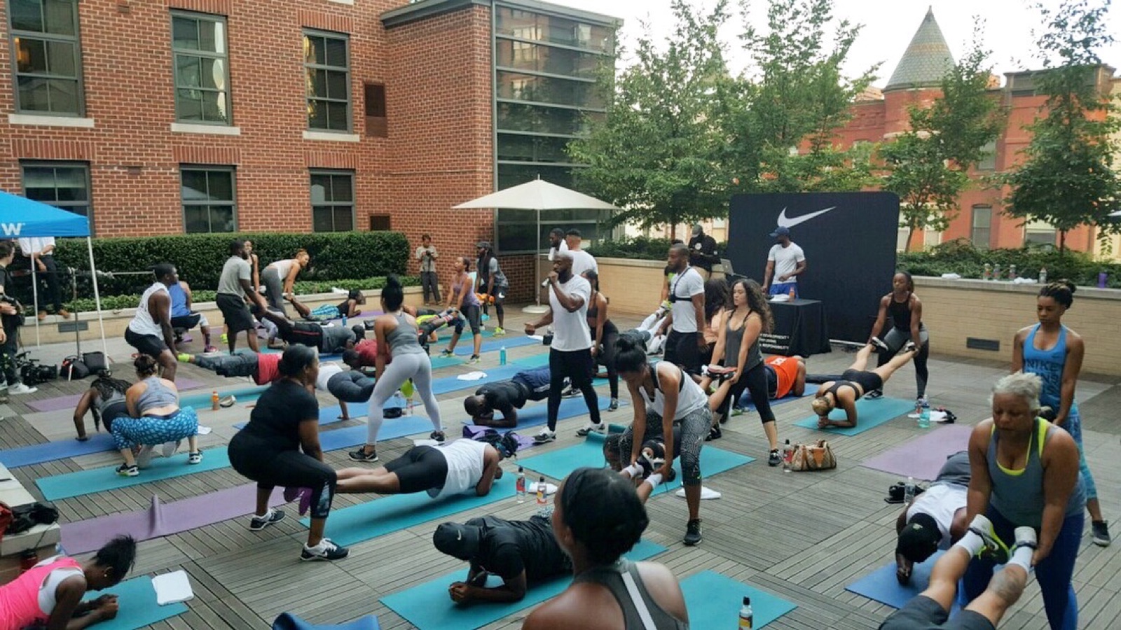 Outdoor wellness class in a courtyard